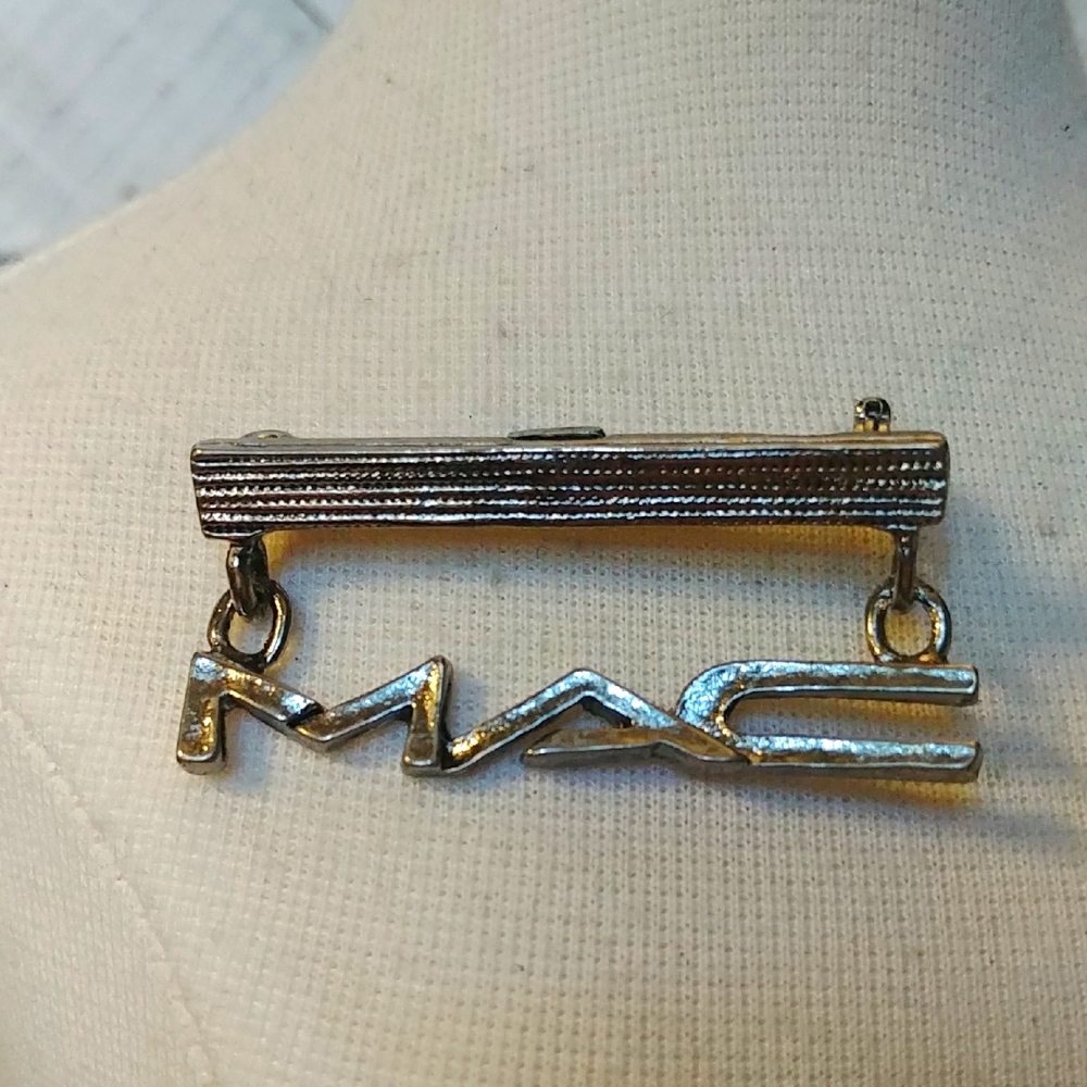 M.A.C. Cosmetics Brooch/Pin Gun Metal Colour